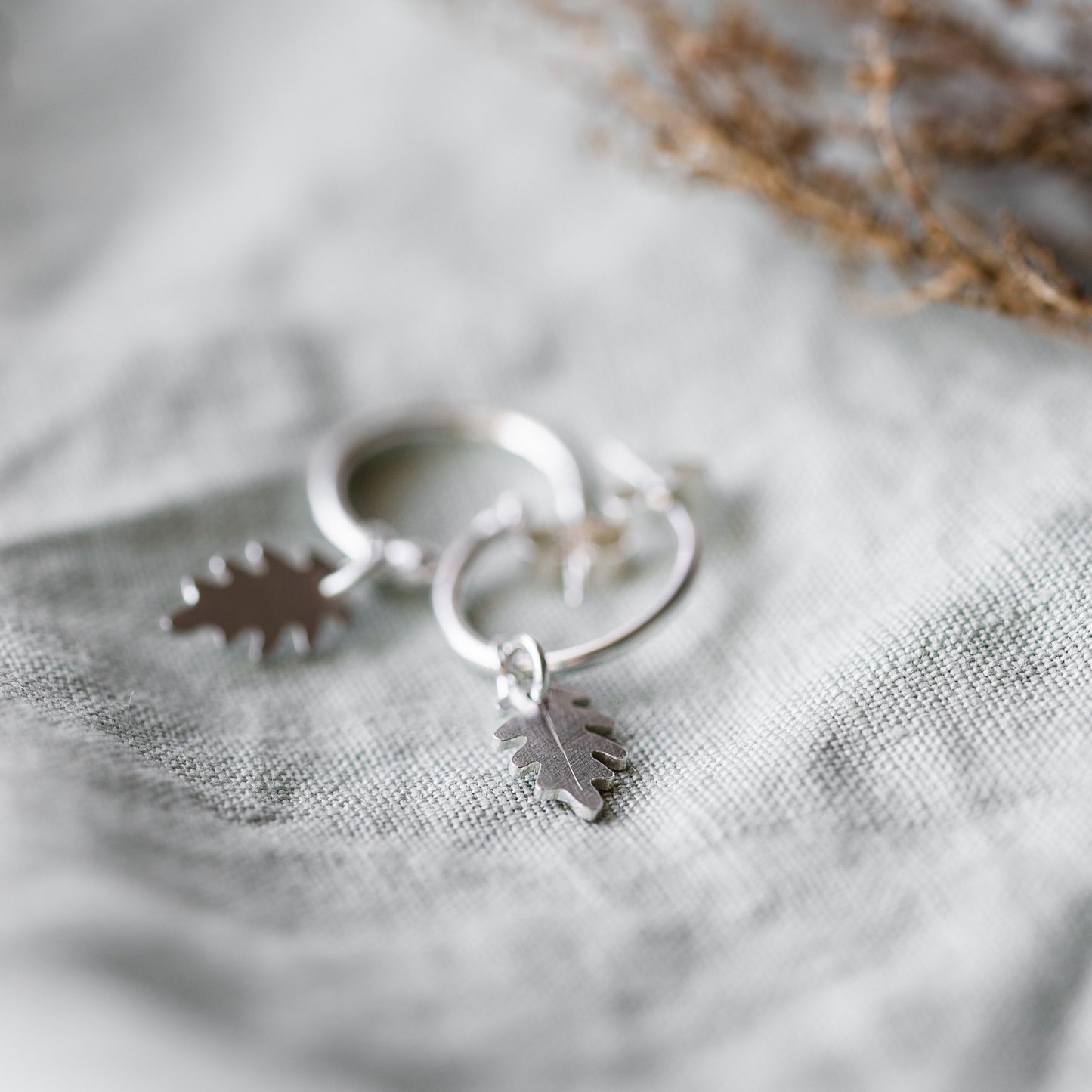 Silver Leaf Hoop Earrings Handmade by Anna Calvert Jewellery in the UK