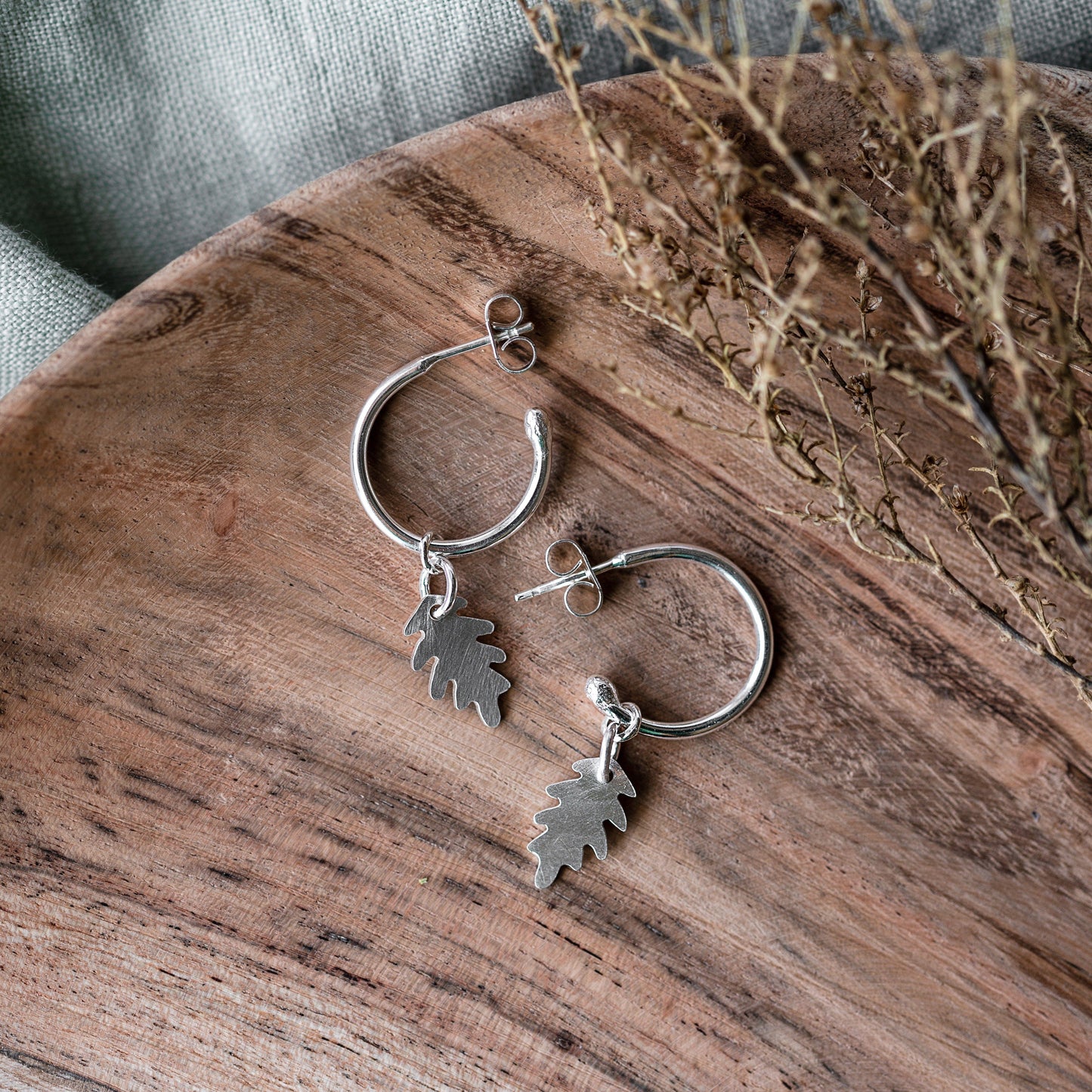 Silver Leaf Hoop Earrings Handmade by Anna Calvert Jewellery in the UK