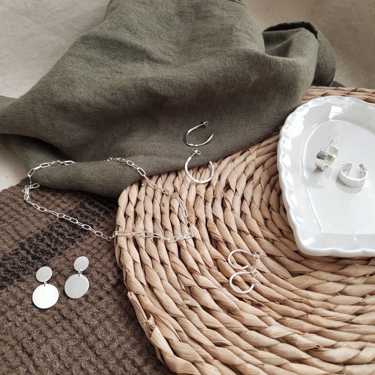 hammered silver jewellery, hoop earrings and a silver chain. Handmade silver jewellery
