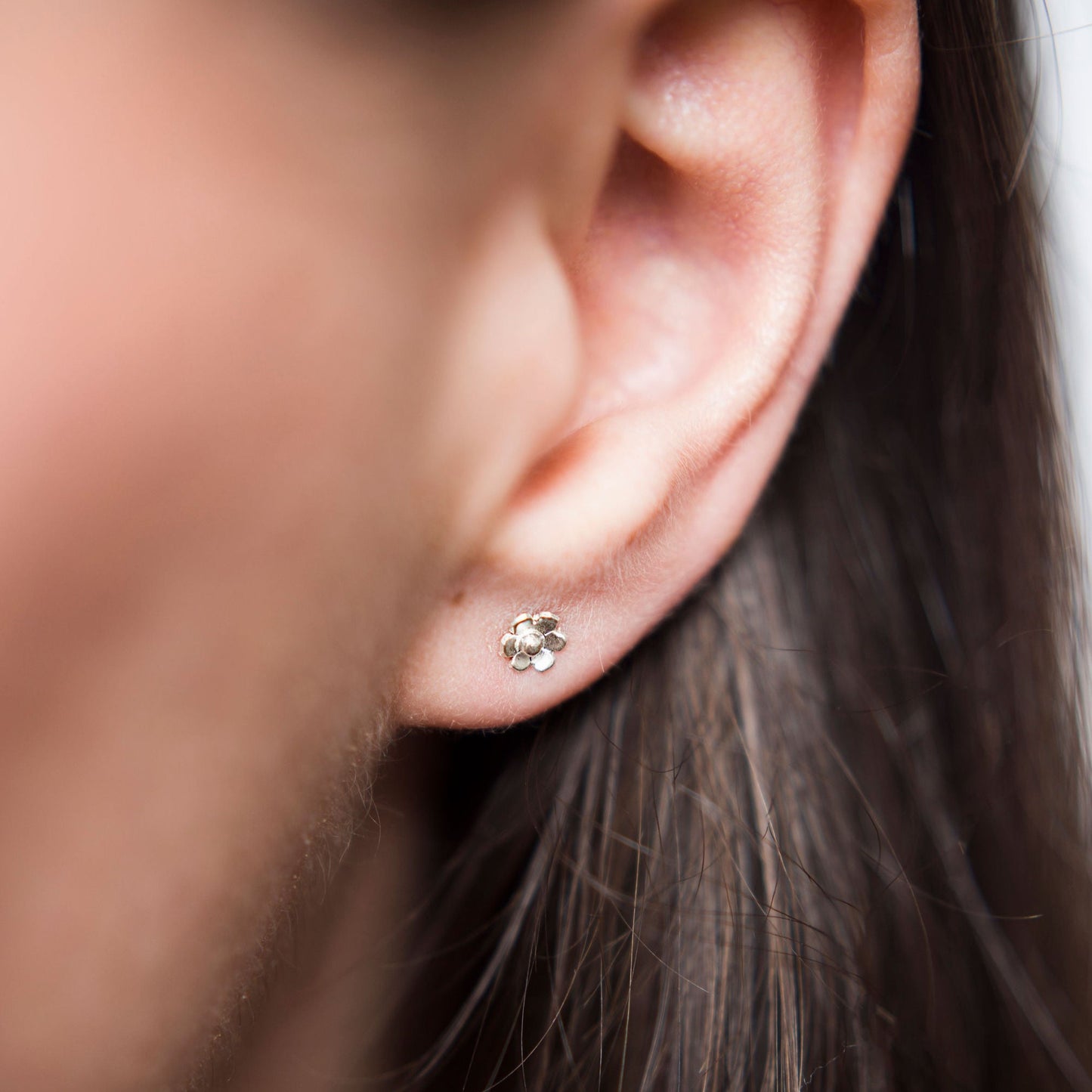 Tiny flower stud earrings, handmade by Anna Calvert Jewellery