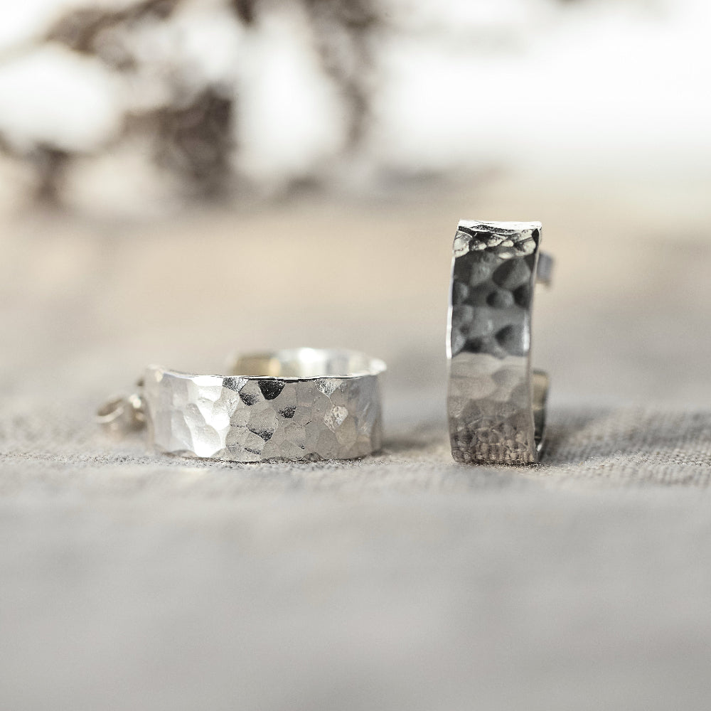 Chunky 6mm wide Silver Hoops Earrings with a hammered finish one laying flat one standing up
