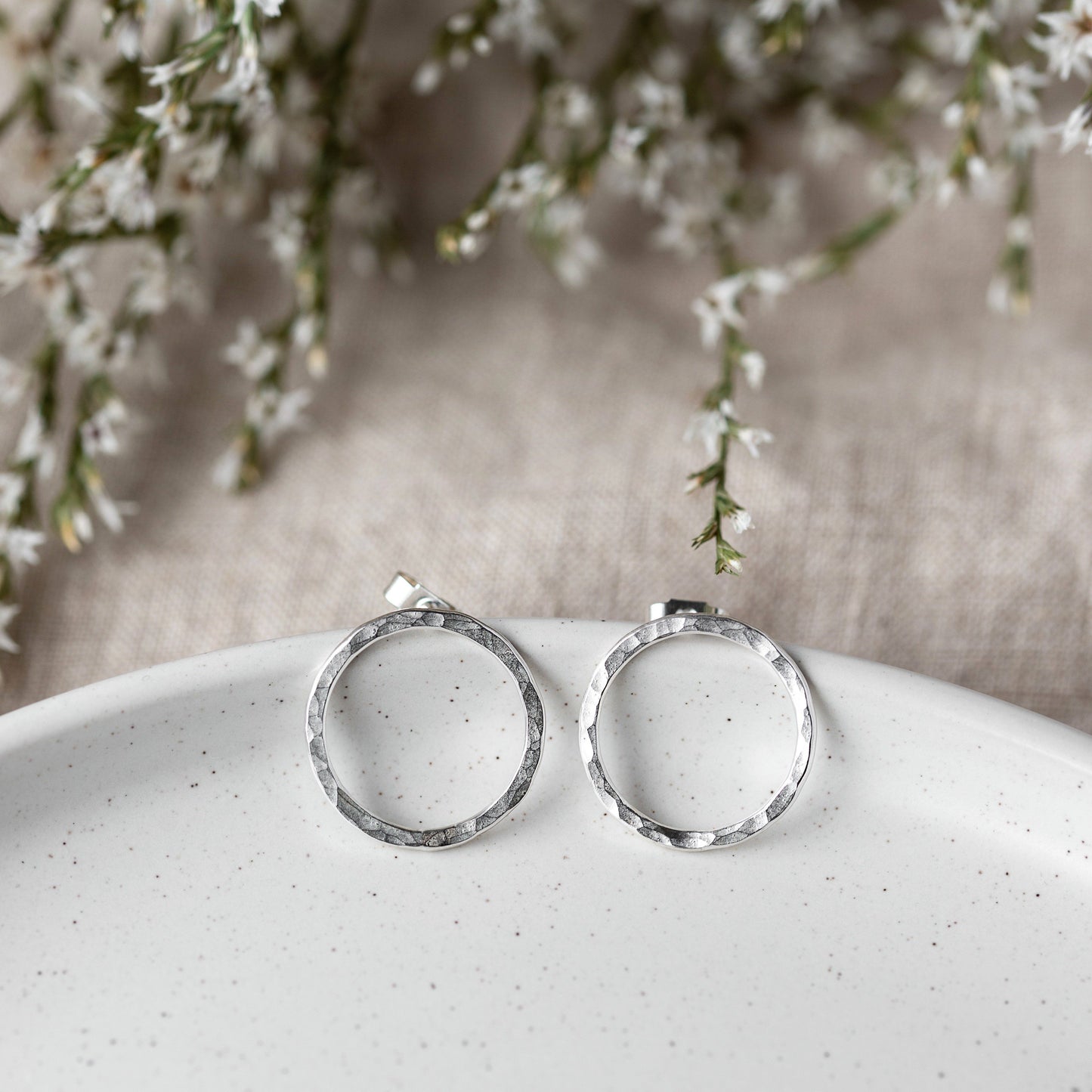 Large Hammered Circle Silver Studs Earrings Hanmade by Anna Calvert Jewellery in the UK