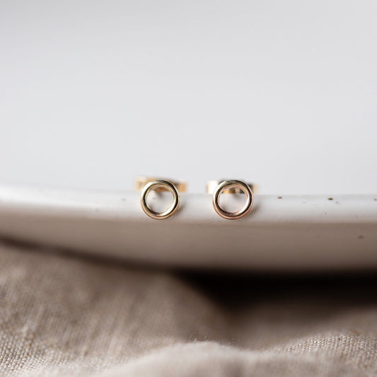 Small Gold Circle Stud Earrings handmade by Anna Calvert Jewellery in the UK
