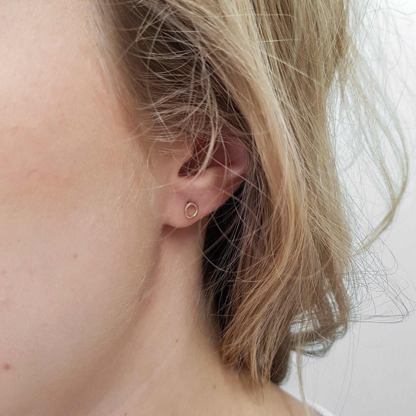Small Gold Circle Stud Earrings handmade by Anna Calvert Jewellery in the UK