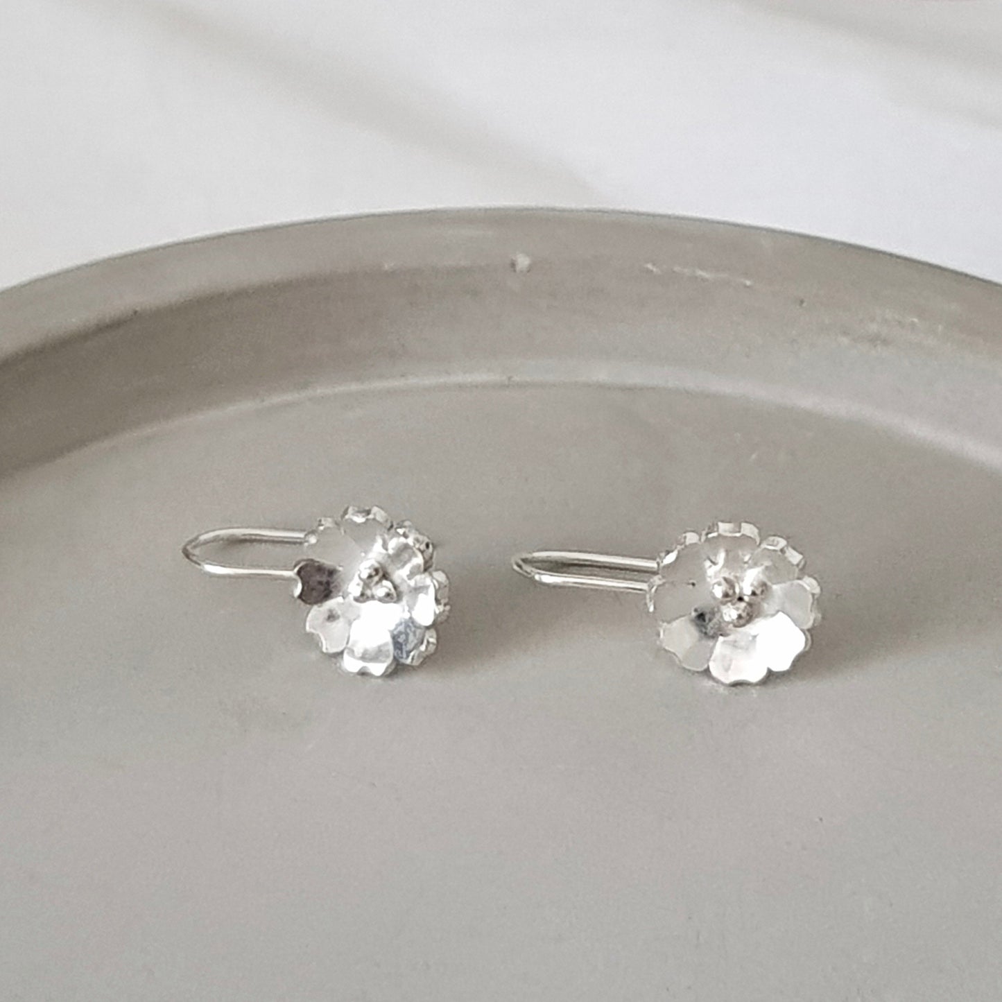 Dangly Silver Flower Hook Earrings, Handmade by Anna Calvert Jewellery in the UK