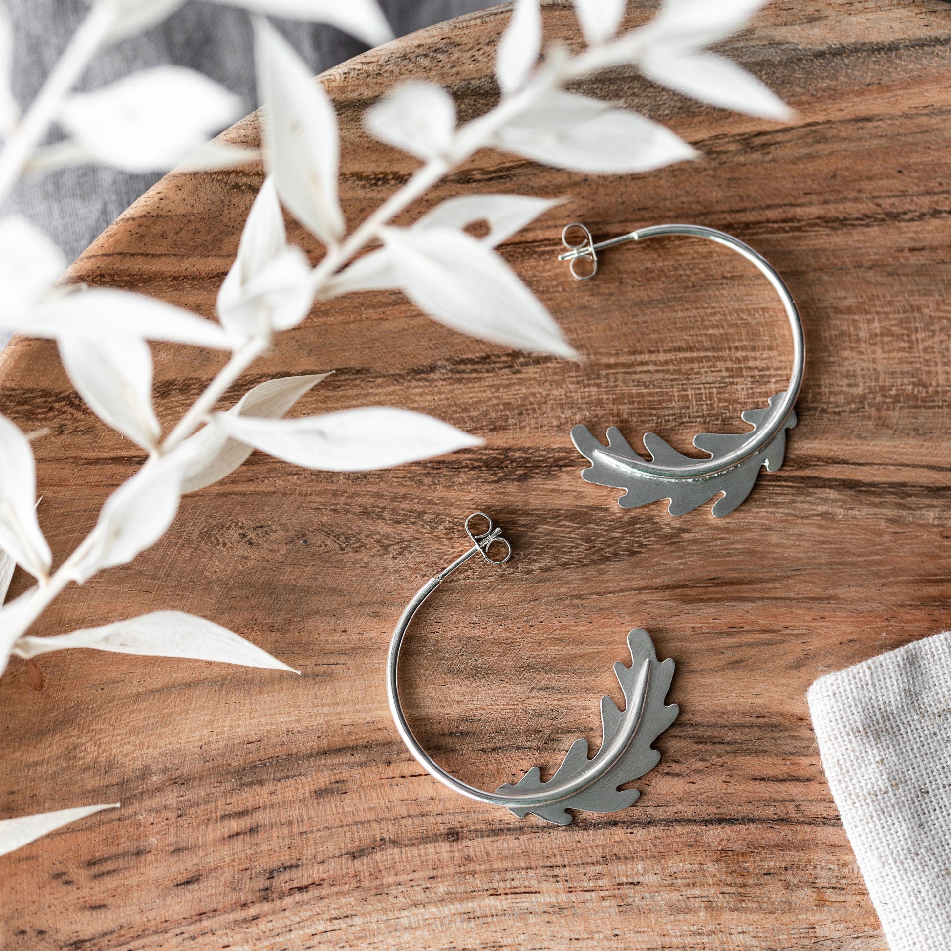 Oak Leaf Silver Hoops Earrings Handmade by Anna Calvert Jewellery in the UK